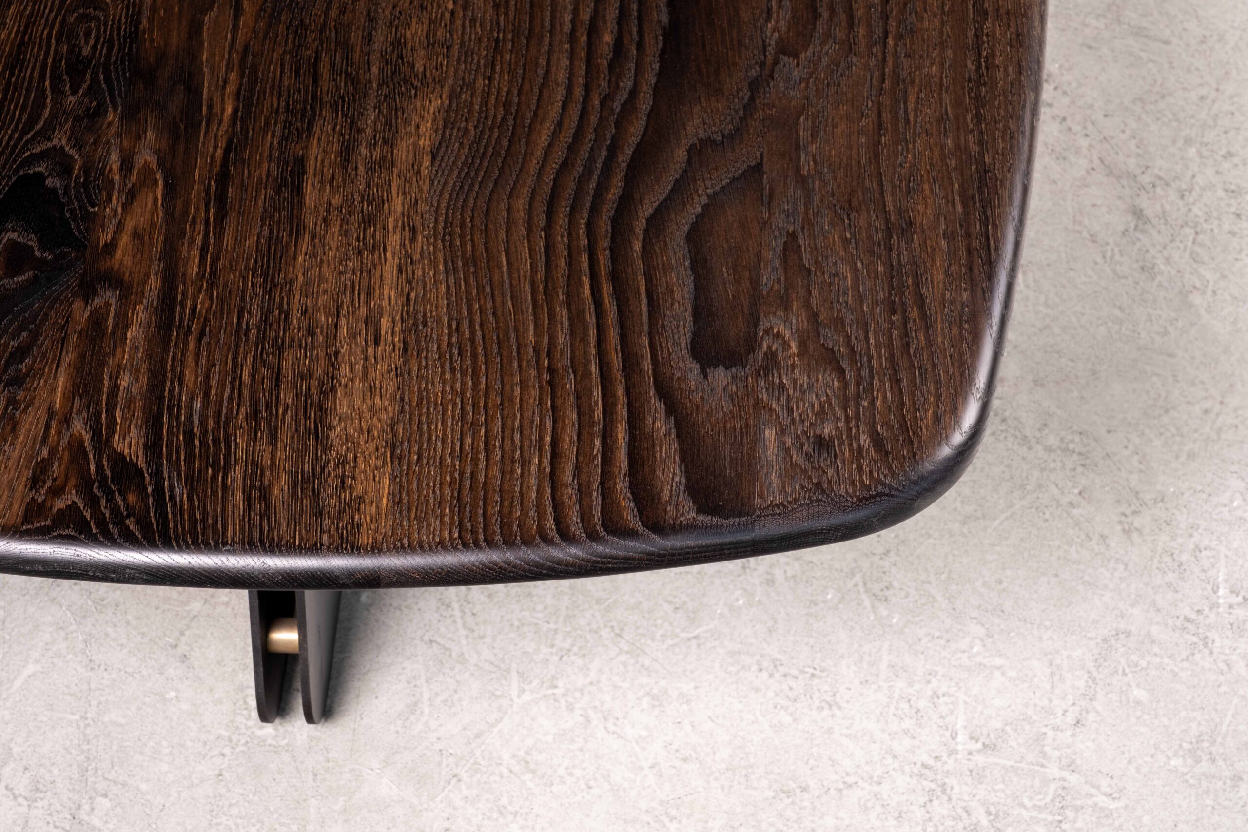 The Propeller coffee table, bullnosed ebonised oak.